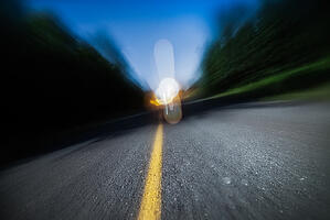 A blurry road for sleepy drivers.